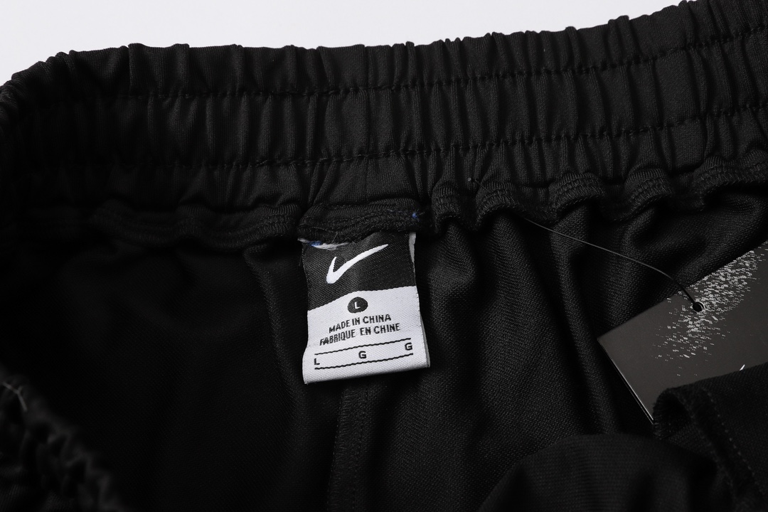 Nike Oversized Swoosh Zip Pocket Shorts