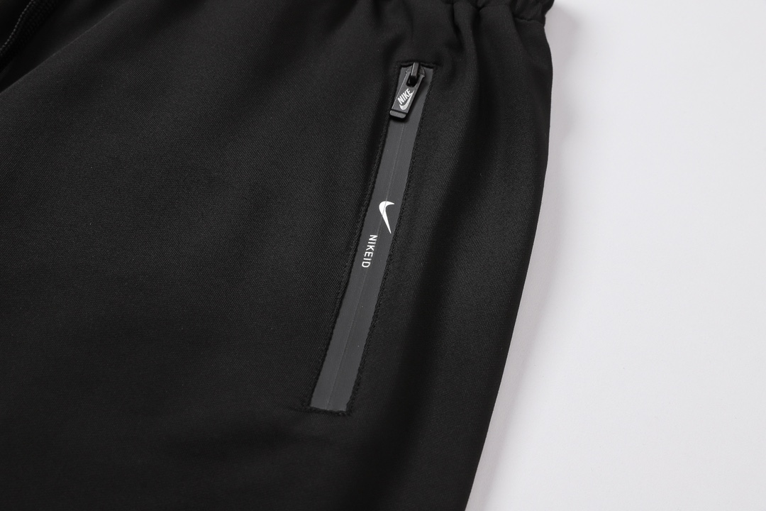 Nike Oversized Swoosh Zip Pocket Shorts