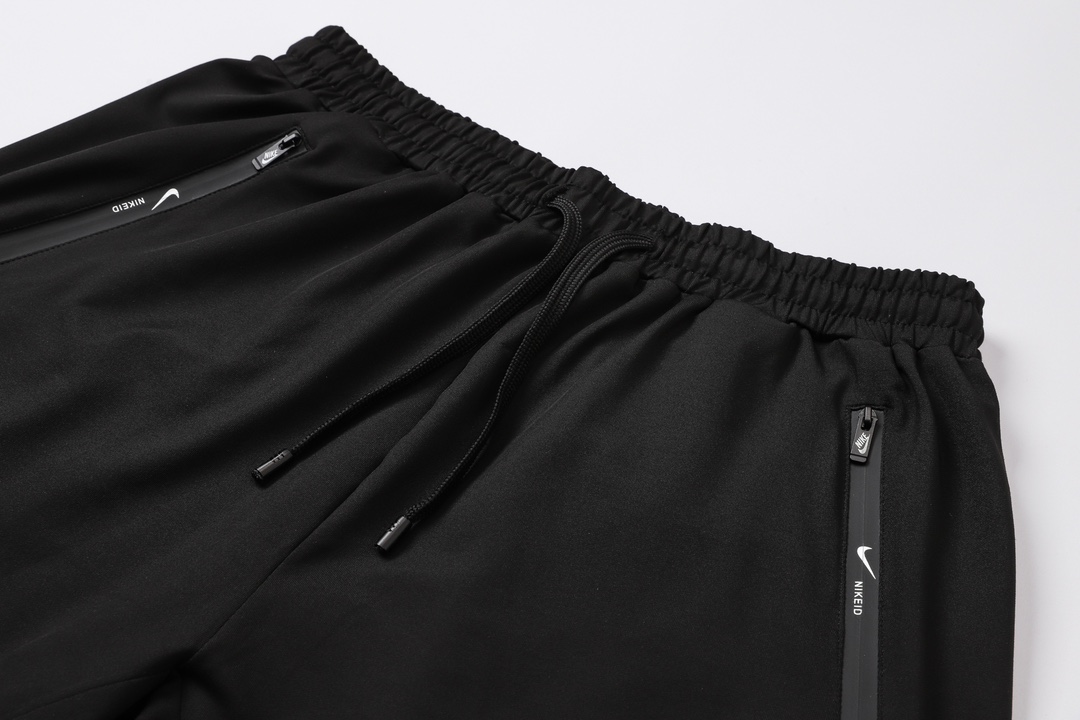 Nike Oversized Swoosh Zip Pocket Shorts