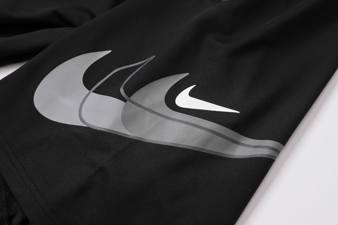 Nike Oversized Swoosh Zip Pocket Shorts
