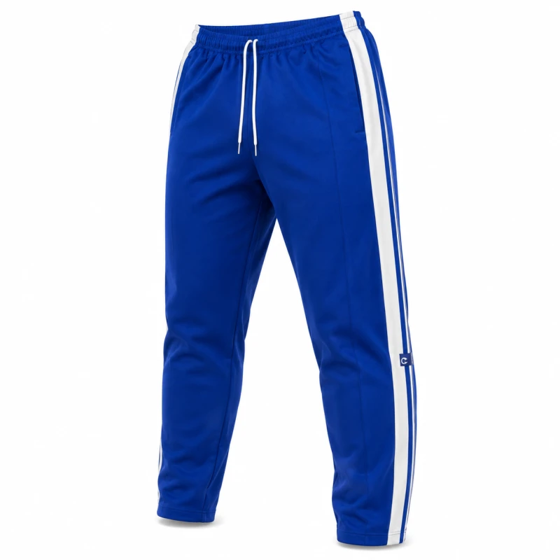 Adidas Originals Blue Track Pants Featuring The Iconic 3 Stripes Design.